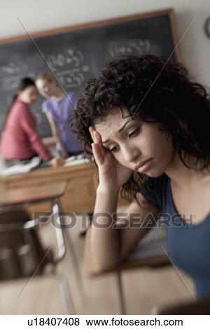 Stock Photo - Teenage girls (14-15, 16-17) at school. Fotosearch