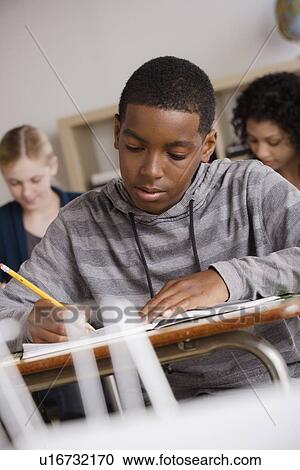 Teenage students (14-15, 16-17) at school View Large Photo Image Stock Image - Teenage students (14-15, 16-17) at school. Fotosearch