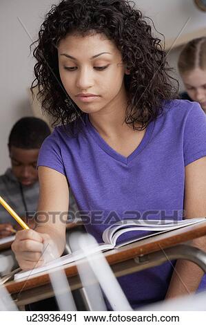 Teenage students (14-15, 16-17) at school View Large Photo Image Stock Image - Teenage students (14-15, 16-17) at school. Fotosearch