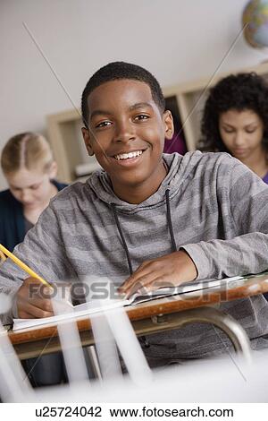 Teenage students (14-15, 16-17) at school View Large Photo Image Stock Image - Teenage students (14-15, 16-17) at school. Fotosearch