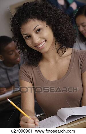 Teenage students (14-15, 16-17) at school View Large Photo Image Stock Image - Teenage students (14-15, 16-17) at school. Fotosearch