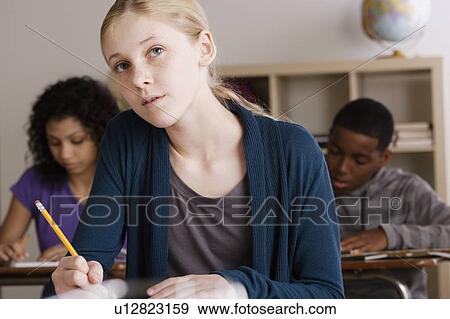Teenage students (14-15, 16-17) at school View Large Photo Image Stock Photo - Teenage students (14-15, 16-17) at school. Fotosearch