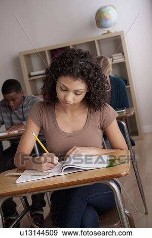 Teenage students (14-15, 16-17) at school View Large Photo Image Stock Photo - Teenage students (14-15, 16-17) at school. Fotosearch