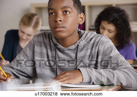Stock Photo - Teenage students (14-15, 16-17) at school. Fotosearch