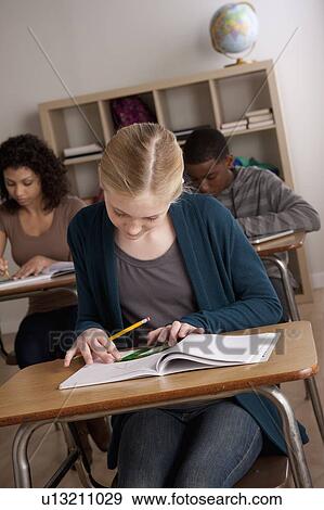 Teenage students (14-15) at school View Large Photo Image Stock Photo - Teenage students (14-15) at school. Fotosearch