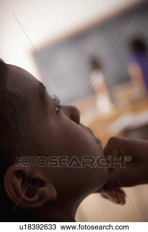 Stock Image - Teenagers (14-15, 16-17) at school. Fotosearch