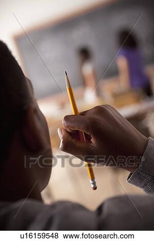 Stock Photo - Teenagers (14-15, 16-17) at school. Fotosearch
