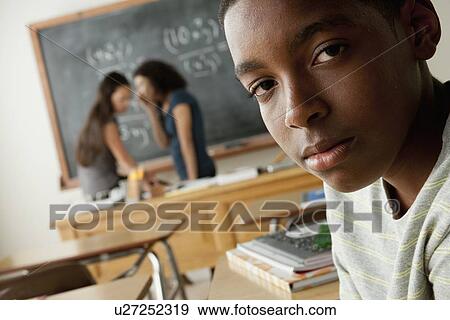 Stock Photo - Teenagers (14-15, 16-17) at school. Fotosearch