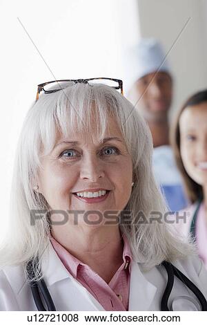 Stock Photo - Three doctors. Fotosearch