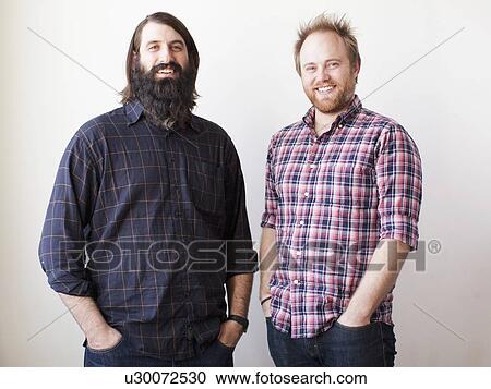 Two bearded males posing together View Large Photo Image Stock Image - Two bearded males posing together. Fotosearch