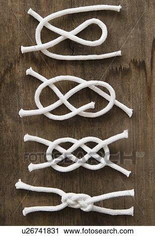 Stock Image - Tying reef knot step by step. Fotosearch