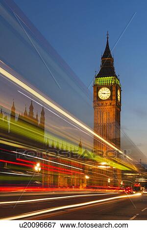 Stock Photo - UK, England, London, Big Ben and light trails at night. Fotosearch