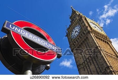 Stock Image - UK, England, London, Big Ben and underground sign. Fotosearch
