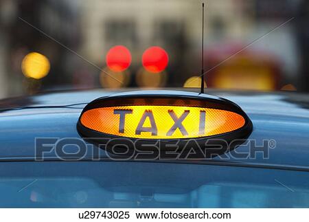 UK, England, London, Sign on taxi cab View Large Photo Image Stock Photography - UK, England, London, Sign on taxi cab. Fotosearch