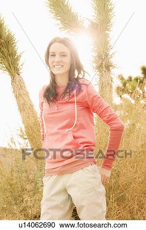 USA, California, Joshua Tree National Park, Portrait of young woman in desert View Large Photo Image Stock Image - USA, California, Joshua Tree National Park, Portrait of young woman in desert. Fotosearch