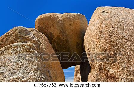Stock Image - USA, California, Joshua Tree National Park, Desert rocks. Fotosearch