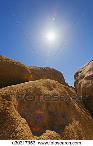 USA, California, Joshua Tree National Park, Desert rocks with solar flare View Large Photo Image Stock Image - USA, California, Joshua Tree National Park, Desert rocks with solar flare. Fotosearch