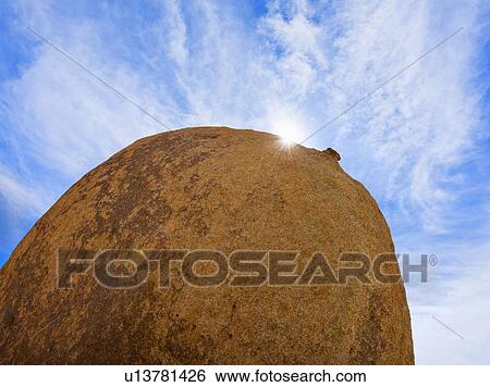 USA, California, Joshua Tree National Park, Boulder with sunny sky View Large Photo Image Stock Photograph - USA, California, Joshua Tree National Park, Boulder with sunny sky. Fotosearch