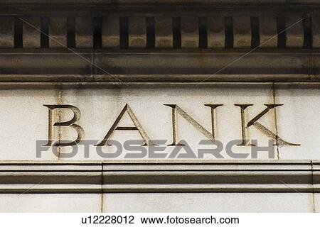 Stock Image - USA, New York City, Detail of bank building. Fotosearch