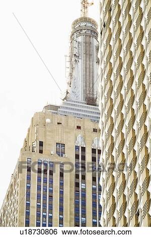 Stock Photograph - USA, New York City, Detail of Empire State Building. Fotosearch