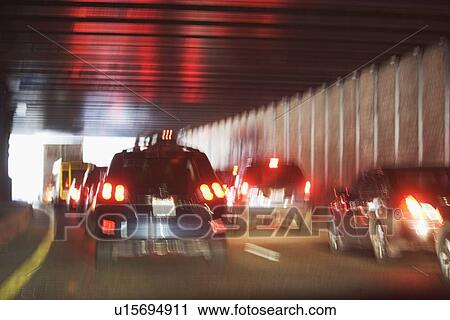 Stock Image - USA, New York, Long Island, New York City, Traffic jam in tunnel. Fotosearch