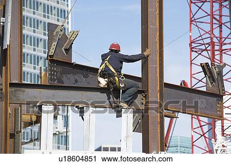 USA, New York, Long Island, New York City, Male worker on construction site View Large Photo Image Stock Image - USA, New York, Long Island, New York City, Male worker on construction site. Fotosearch