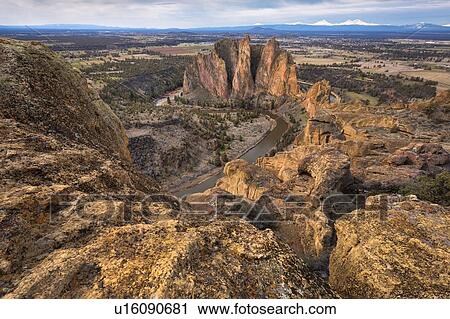 Stock Image - USA, Oregon, Deschutes County, Rocky landscape with view on river. Fotosearch