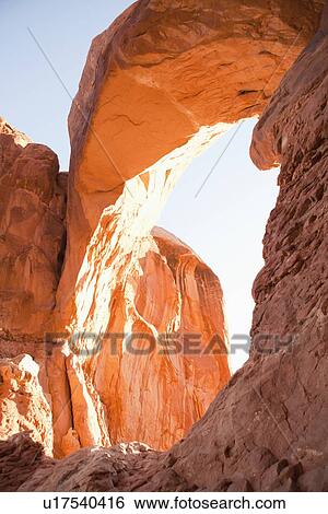 USA, Utah, Moab, Majestic natural arch View Large Photo Image Stock Photograph - USA, Utah, Moab, Majestic natural arch. Fotosearch