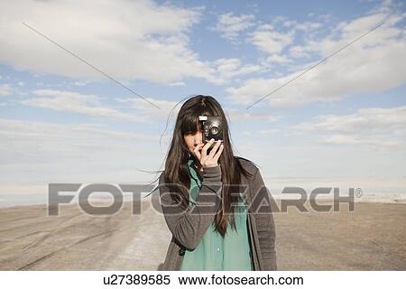 USA, Utah, Salt Lake City, Young woman taking photos View Large Photo Image Stock Photography - USA, Utah, Salt Lake City, Young woman taking photos. Fotosearch