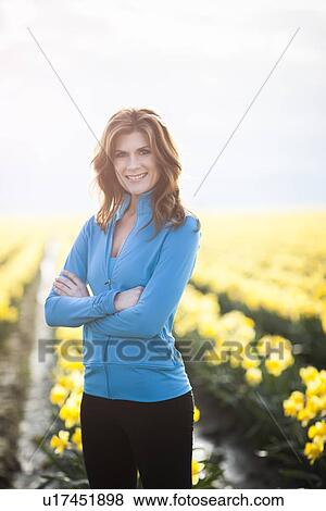 USA, Washington, Skagit Valley, Portrait of woman in blue tracksuit View Large Photo Image Stock Photo - USA, Washington, Skagit Valley, Portrait of woman in blue tracksuit. Fotosearch