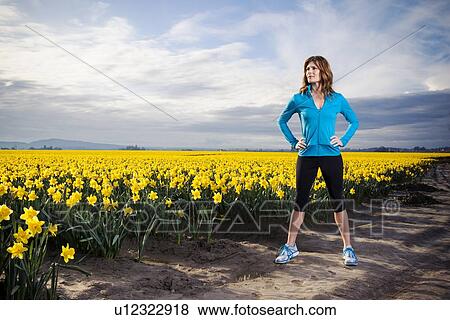 USA, Washington, Skagit Valley, Woman exercising in rural area View Large Photo Image Stock Photo - USA, Washington, Skagit Valley, Woman exercising in rural area. Fotosearch