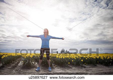 USA, Washington, Skagit Valley, Woman exercising in rural area View Large Photo Image Stock Photo - USA, Washington, Skagit Valley, Woman exercising in rural area. Fotosearch