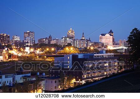 Stock Photo - USA, Wisconsin, Milwaukee, City view at night. Fotosearch
