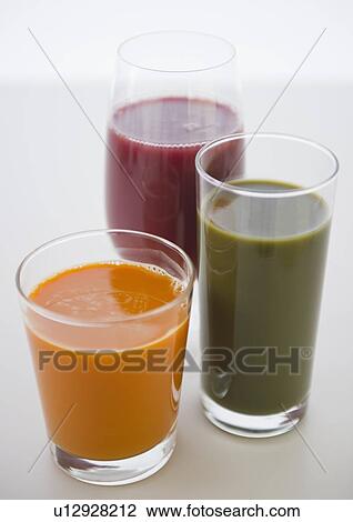 Stock Image - Various fresh juices in glasses. Fotosearch