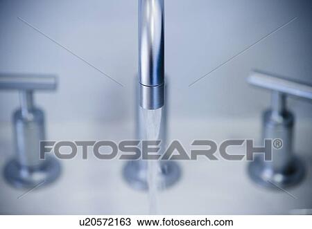 Water flowing from faucet View Large Photo Image Stock Image - Water flowing from faucet. Fotosearch