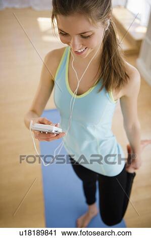 Woman exercising View Large Photo Image Stock Image - Woman exercising. Fotosearch