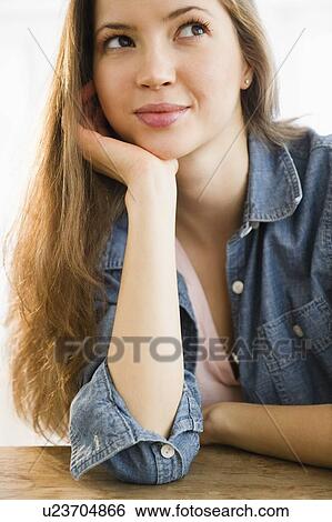 Woman leaning on elbow View Large Photo Image Stock Photograph - Woman leaning on elbow. Fotosearch