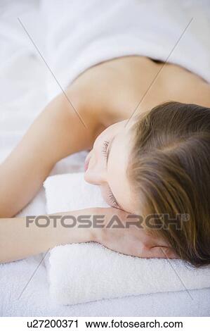 Woman relaxing in spa View Large Photo Image Stock Image - Woman relaxing in spa. Fotosearch