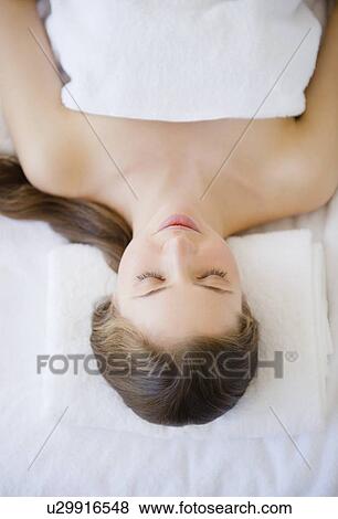 Stock Photo - Woman relaxing in spa. Fotosearch