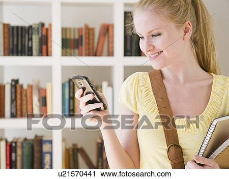 Woman text messaging View Large Photo Image Stock Image - Woman text messaging. Fotosearch