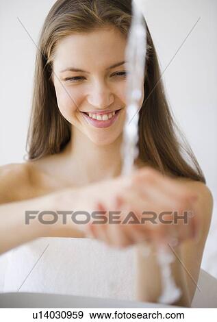 Woman washing hands View Large Photo Image Stock Photo - Woman washing hands. Fotosearch