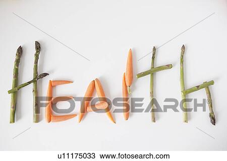 Stock Image - Word 'health' made out of vegetables, studio shot. Fotosearch