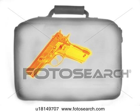 Stock Photo - X-ray image showing handbag containing pistol. Fotosearch