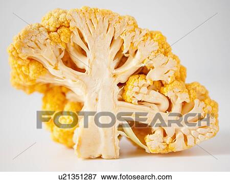 Stock Photo - Yellow cauliflower on white background. Fotosearch