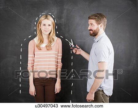 Young couple, man with chalk outline View Large Photo Image Stock Image - Young couple, man with chalk outline. Fotosearch