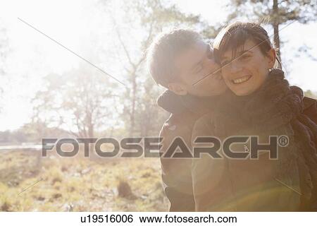 Young couple on romantic walk View Large Photo Image Stock Photograph - Young couple on romantic walk. Fotosearch