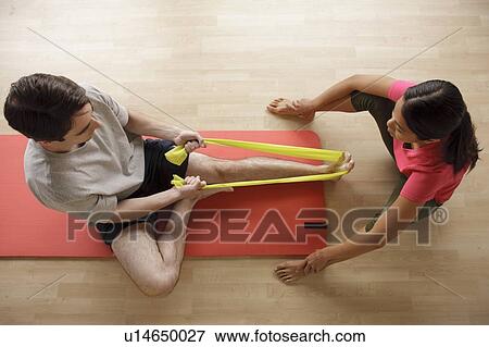 Young couple training together View Large Photo Image Stock Photo - Young couple training together. Fotosearch