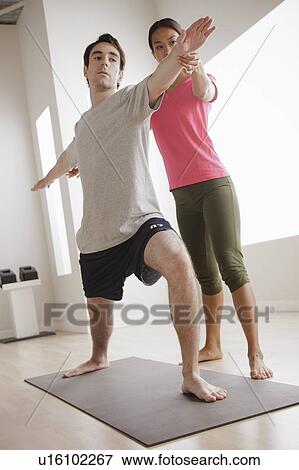 Stock Photo - Young couple training together. Fotosearch