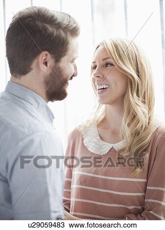 Young happy couple together View Large Photo Image Stock Image - Young happy couple together. Fotosearch