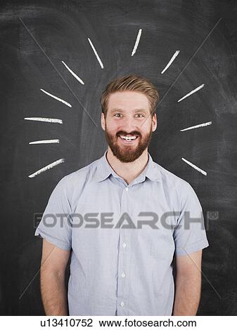 Young man with chalk lines around head, studio shot View Large Photo Image Stock Image - Young man with chalk lines around head, studio shot. Fotosearch